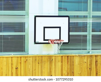Basketball hoop and billboard sport in the school gym. Empty gym after training Stock Photo