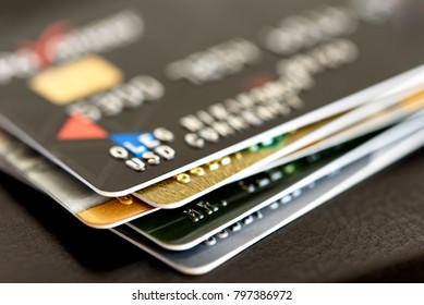 Credit card close-up. Plastic card on black background Stock fotografie