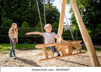 Girl Behind Boy Pretending Push Him Stock Photo 99733553