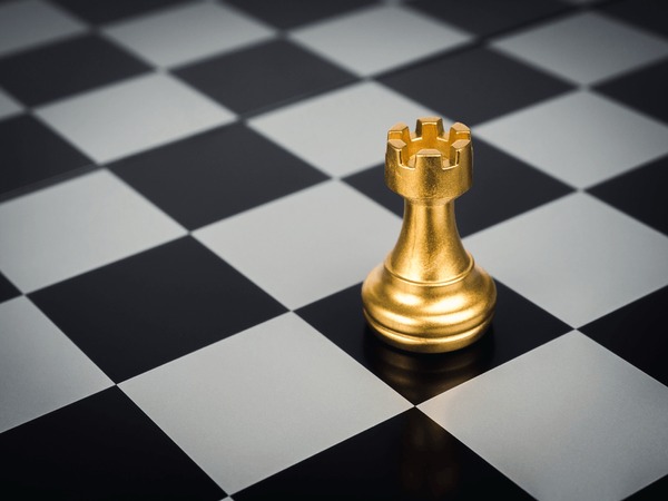 Chess Queen And Rooks On Board Stock Photo - Download Image Now - Chess, Tower, Chess Board - iStock