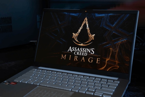 On the laptop screen is the logo of the computer game "Assassin's Creed Mirage". Russia, Moscow, September 27, 2023. Editorial Stock Photo