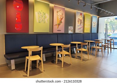 PENANG, MALAYSIA - 12 FEB 2022: Interior view of Baskin-Robbins store. Baskin-Robbins is the world's largest chain of ice cream specialty shop restaurants. Editorial Stock Photo