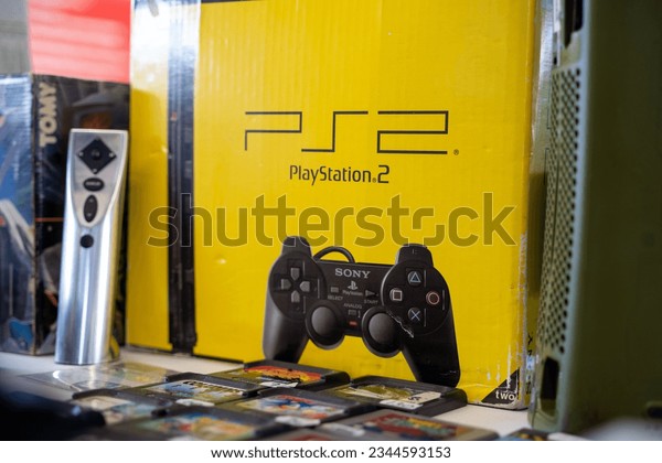 Sony Slim PS2 Console With Extra Pad, Memory Card And 20 Game Cds