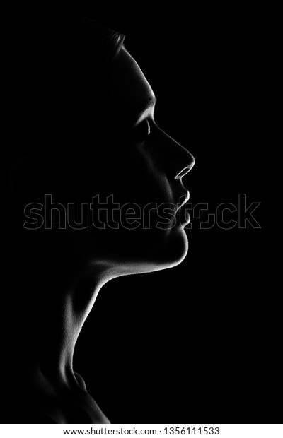 Sad Woman Profile Silhouette On Black Stock Photo 1356111533