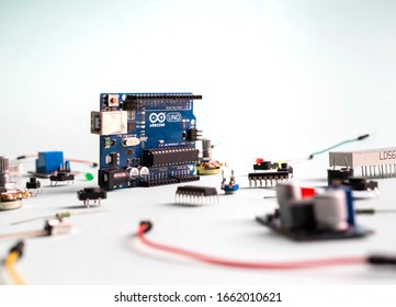 Sankt-Petersburg, Russia - February 28, 2020: Arduino UNO board on light background DIY components. Microcontrollers, boards, sensors, leds, controllers, Microcontroller for programming.
 Editorial Stock Photo