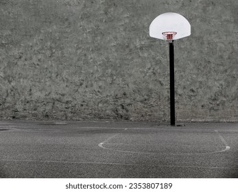 Urban basketball hoop in concrete playground textures grungy Stock Photo