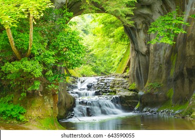 Waterfall in the mountains Stock Photo