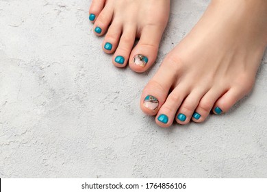 Womans Feet On Gray Concrete
