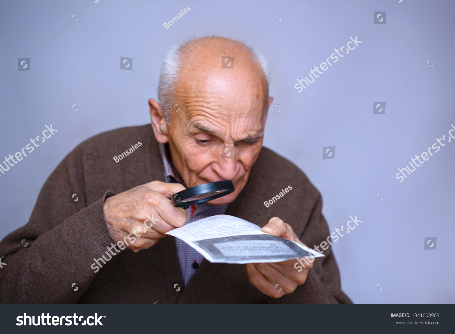 Old Man Low Vision Reading Text Stock Photo 1341008963 Shutterstock