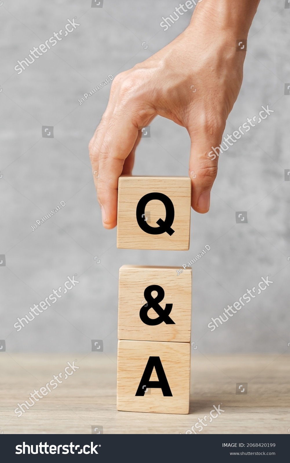 Hand Holding Q Word Wooden Block Stock Photo 2068420199 | Shutterstock