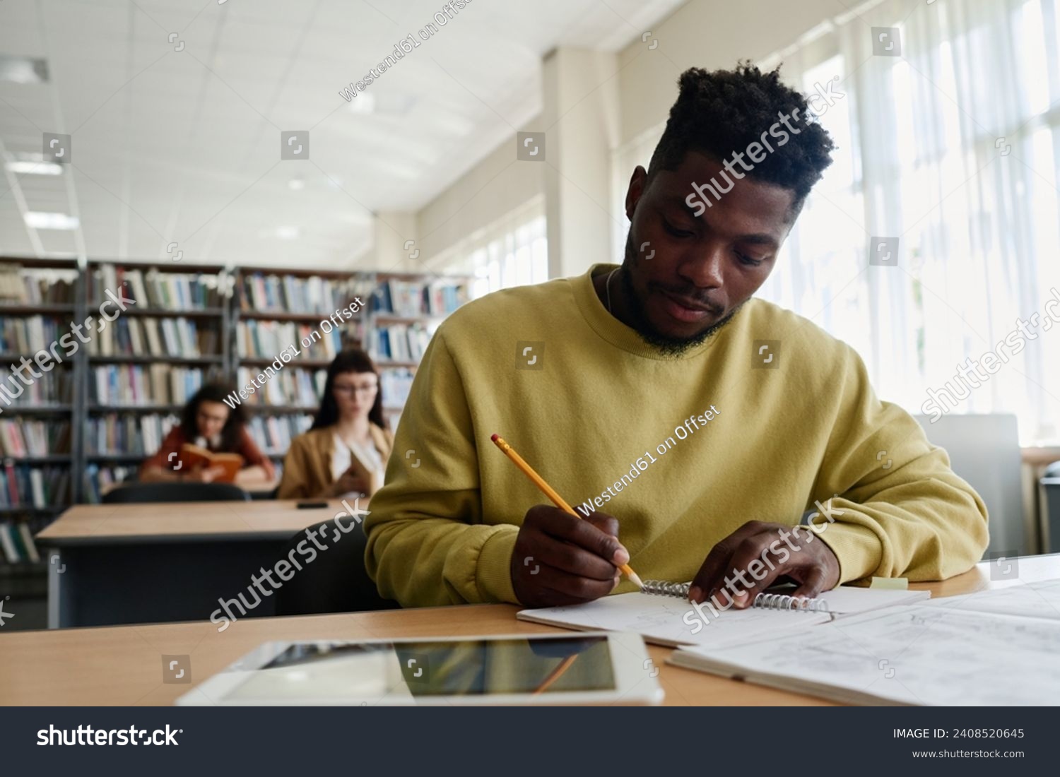 Young Student Writing Book Desk Stock Photo 2408520645 | Shutterstock