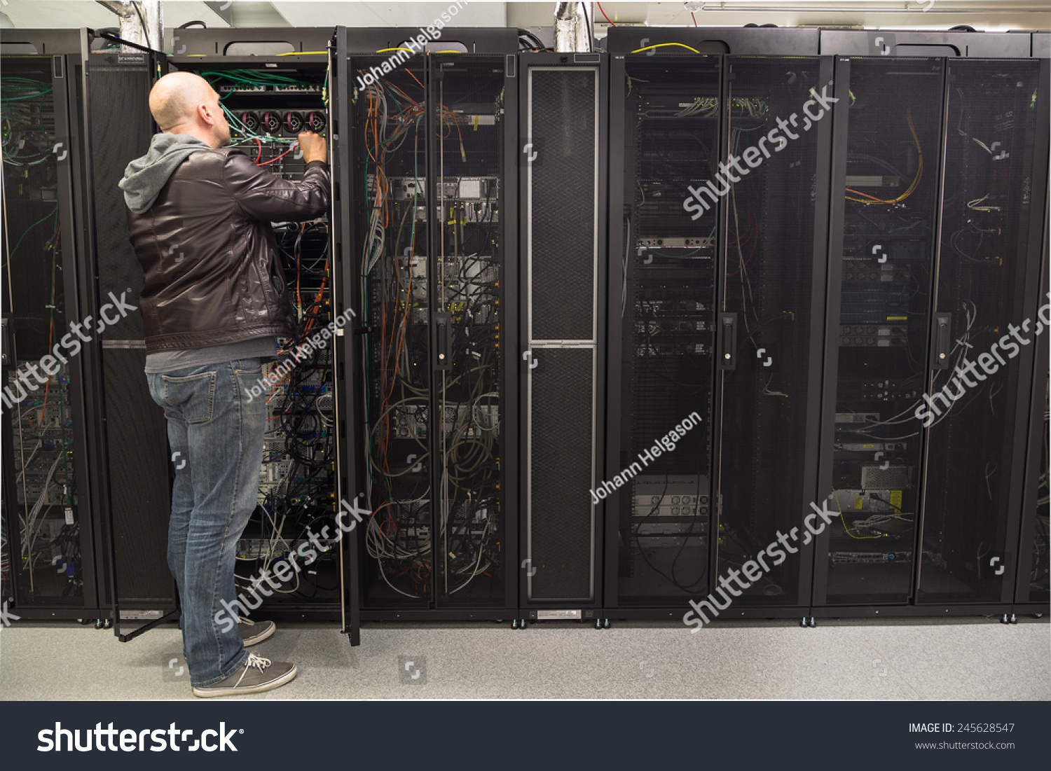 Network Administrator Working On Cabling Server Stock Photo 245628547