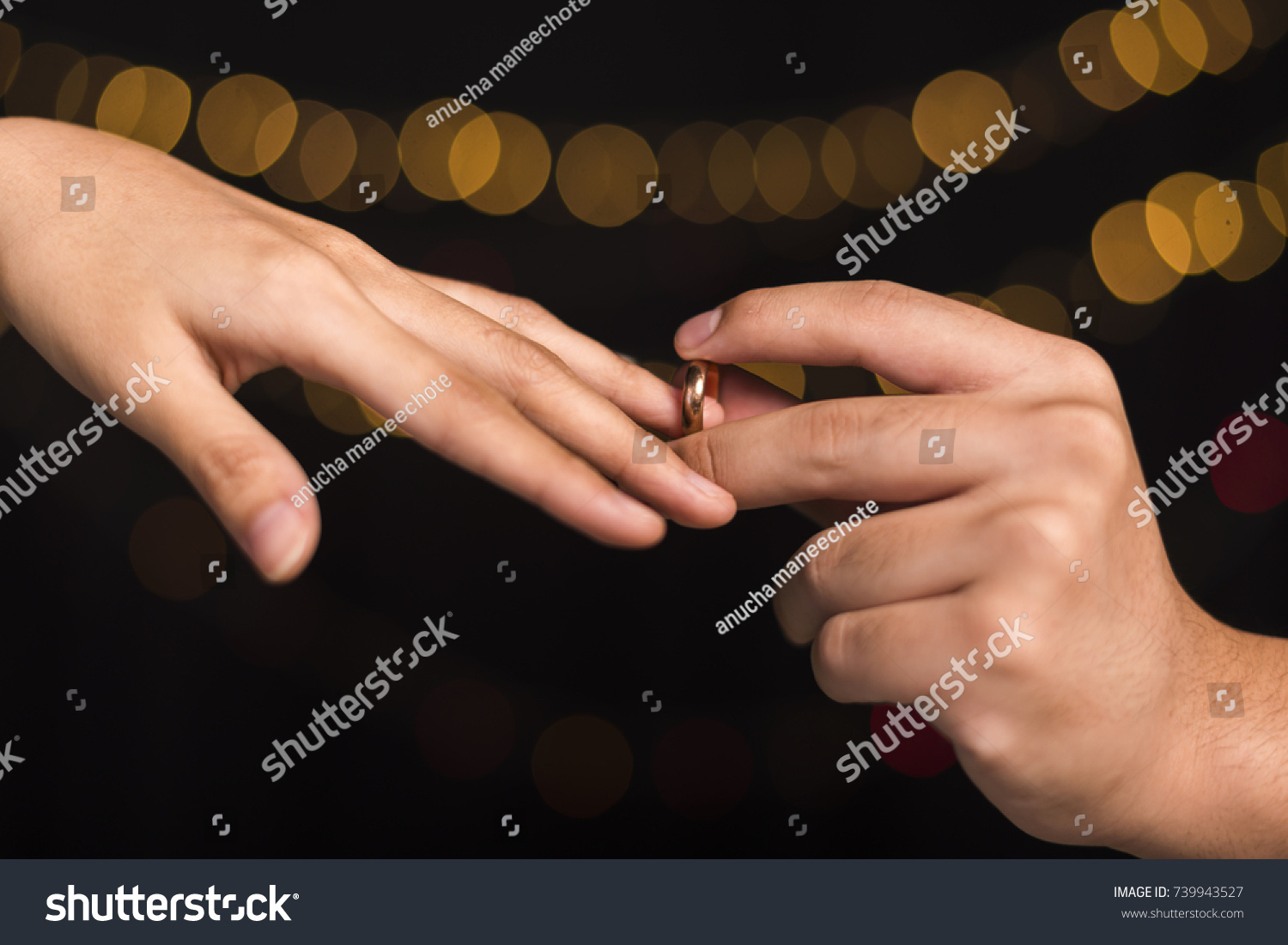 Placing Wedding Ring On Finger