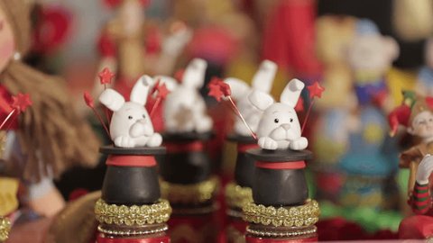 birthday party table with circus theme and rabbit in a hat